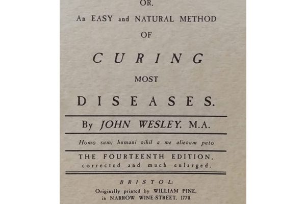 Book cover, with printed letters. That reads Primitive Physic by John Wesley